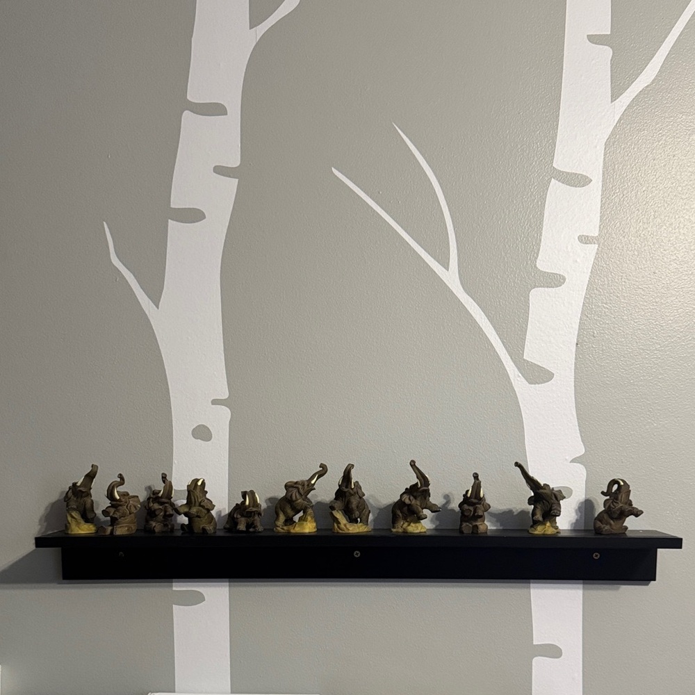 Set of 11 resin elephants